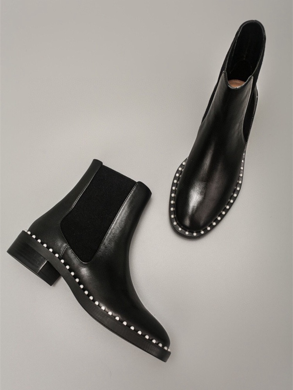 Stuart Weitzman Black Leather Chelsea Boots with Silver Stud Detailing